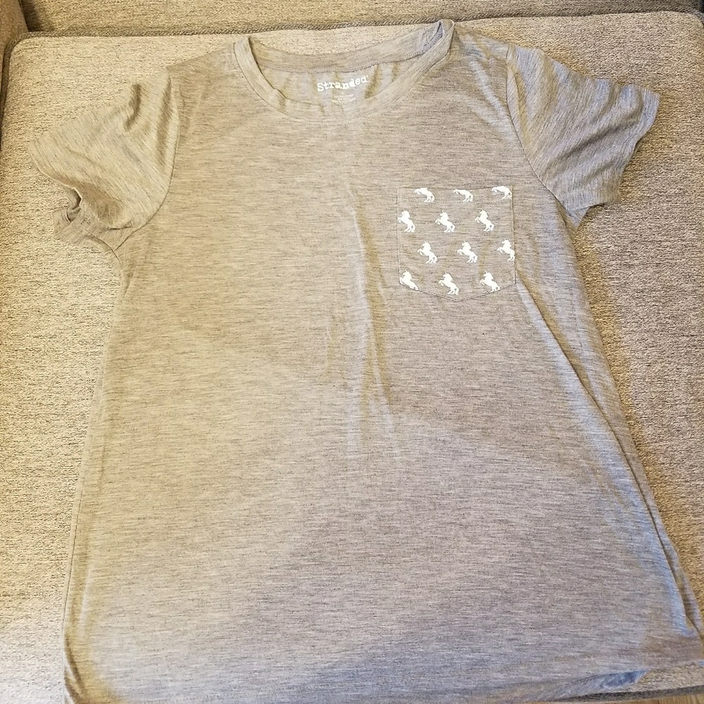 Stranded unicorn pocket tee
